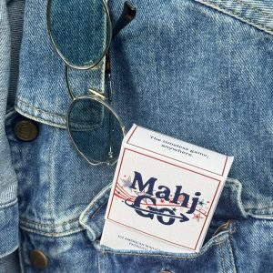 Patriotic MahjGo mahjong playing cards in a jean jacket pocket